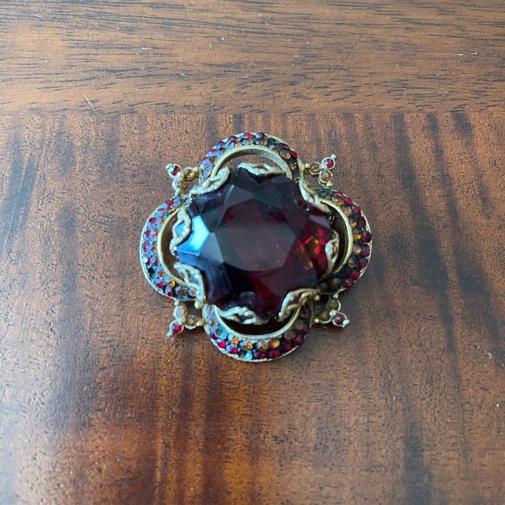 Vintage Corocraft brooch red and orange crystals beautifully made.
